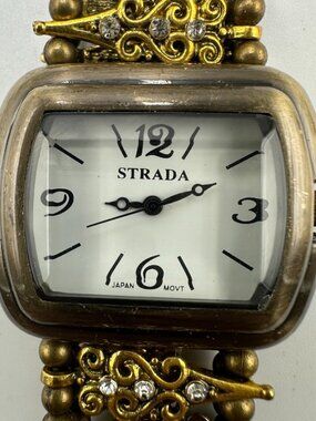 3/$30 Strada Watch Women Brass Tone Scroll Design Stretch Band 7.25 Inch